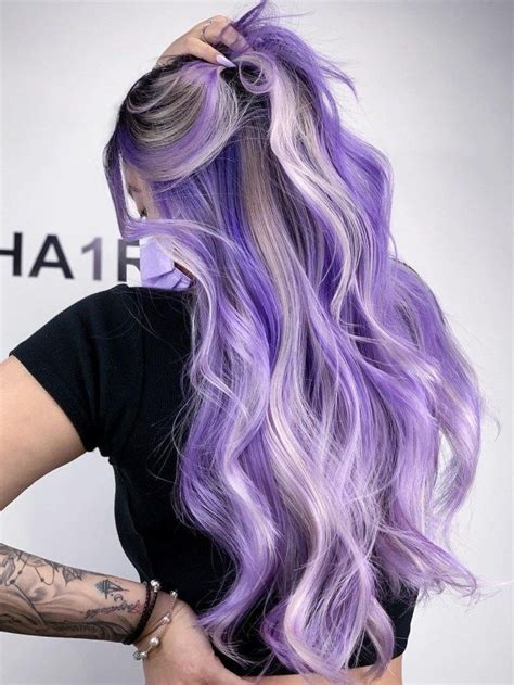 purple hair streaks|blonde hair with purple streaks.